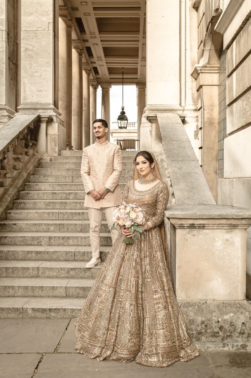 Formal bridal portrait on the steps of a stately building