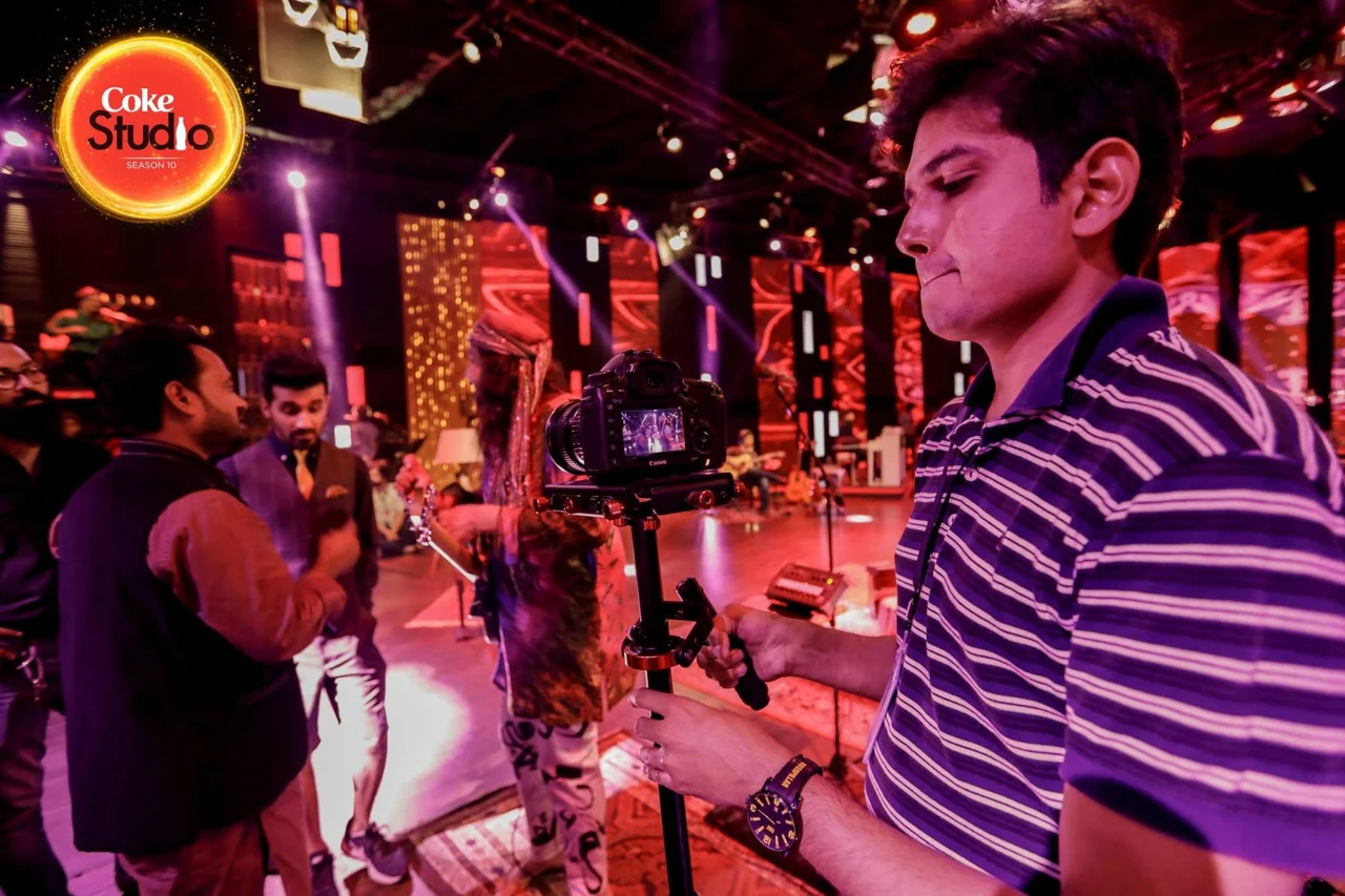 Moiz operating a camera on a stabiliser on the Coke Studio Season 10 set