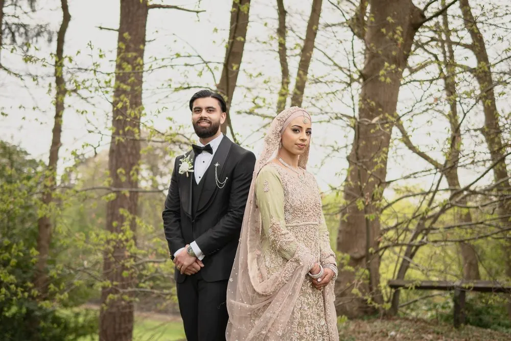 A classic portrait of the couple in the woods