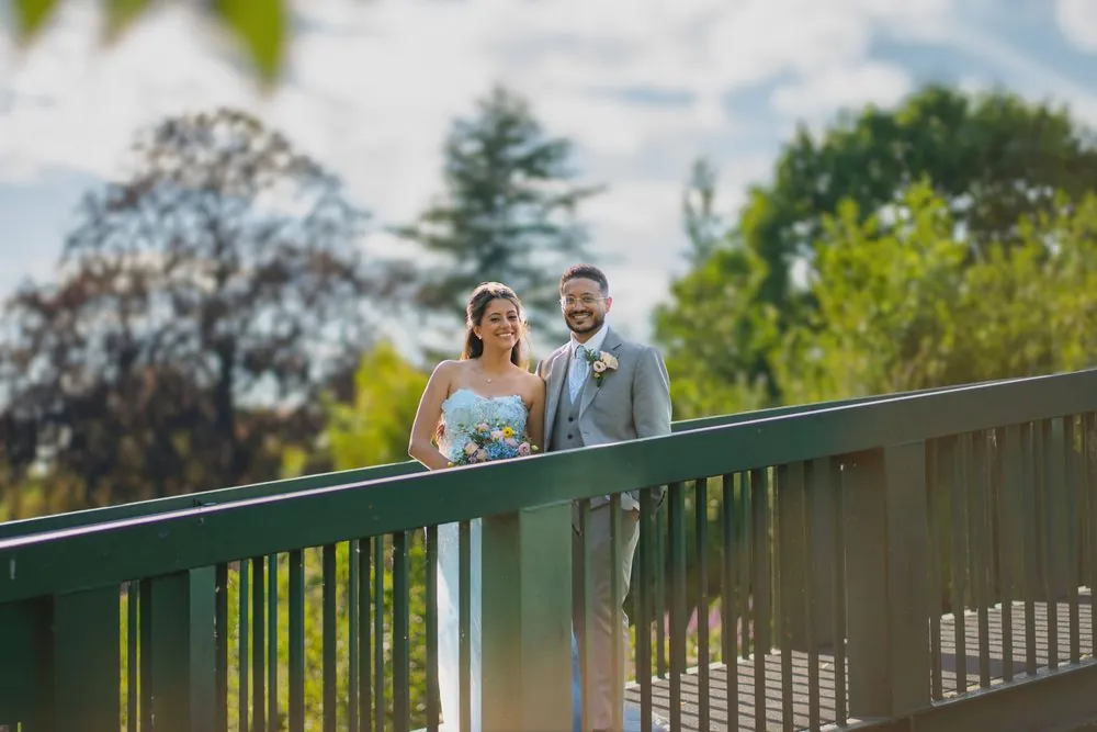 All smiles on the garden footbridge