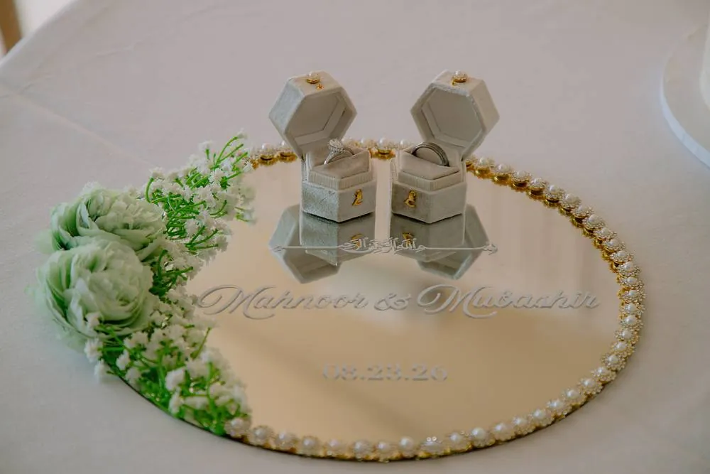 Rings on a pearl mirror tray