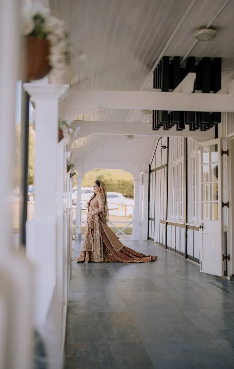 The bride on the long pavilion veranda