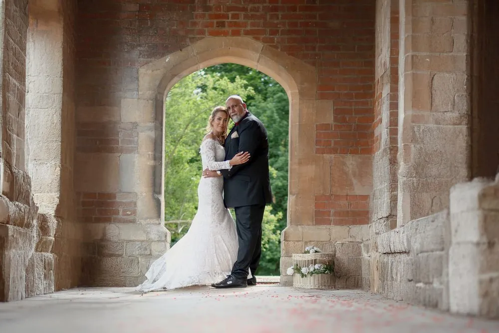 Together beneath the stone archway